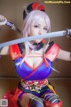 A woman in a cosplay outfit holding two swords.